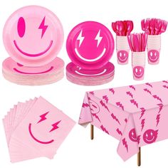 pink party supplies including plates, cups and napkins with lightning bolt design on them