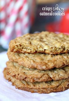 three oatmeal cookies stacked on top of each other with the words crispy cheesy oatmeal cookies