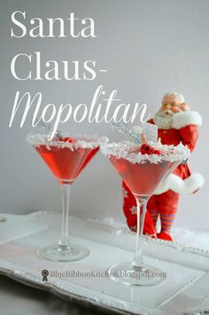 two martinis with santa claus in the background and text overlay that reads, santa claus - metropolitan