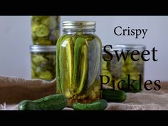 pickles in jars with the words crispy sweet pickles