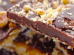 chocolate and nuts are stacked on top of each other in this close - up photo