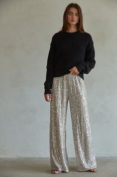 Shimmer and shine in our City of Stars pants. Made with woven polyester spandex and lined with polyester spandex for comfort. Featuring a wide leg, elastic waistband, and sequin accents for a playful, one-of-a-kind look. Perfect for those who want to stand out and have a good time. Outfits With Sequin Pants, Sparkle Pants Outfit, Glitter Pants Outfit, Christmas Party Wear, City Of Stars, Glitter Pants, Sequin Pant, Wide Leg Pants Outfit, Sequin Pants