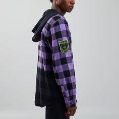 Printed logo on the front chest. An embroidered icon on the chest pocket An embroidered icon on the sleeve Woven patch on sleeve Printed text on the back Long sleeve, button-down Flannel - 100% cotton Double breast pockets Drawstring hood Imported Officially licensed Cyberpunk merchandise Jordan is wearing a large