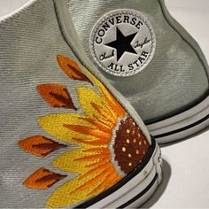 Customized, High Top Chuck Taylor’s These Beautiful Converse High Tops In A Light Blue With Customized Embroidery Of A Sunflower On Each Shoe. Never Worn. See Photos. No Box Or Tags, But 100% Awesome. * I Do My Very Best To Make Sure There Are No Imperfections. If There Are, I Will List Them. I Want My Buyers To Be Happy! However, Sometimes Things Do Slip By. Embroidered Yellow Converse, Acrylic Painted Shoes, Cross Stitch Converse, Embroiderd Converse, Casual Sneakers With Multicolor Embroidery And Appliques, Casual Sneakers With Multicolor Embroidery And Round Toe, Yellow Cotton Sneakers For Spring, Yellow Cotton Spring Sneakers, Casual High-top Sneakers With Embroidered Graphics