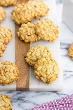 peanut butter cookies are on a cutting board