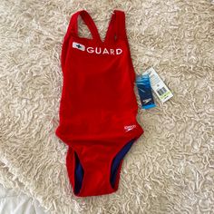 Nwt And In Perfect Condition. Size 30 Is Equivalent To A Us 2. Purchased For Daughter When She Was A Lifeguard In School (This Was One Of Three Purchased And Not Needed). Fully-Lined Front. Fitted Red Swimwear For Water Sports, Sporty Red Swimwear For Swimming, Red One-piece Sport Swimwear, Red One-piece Swimwear For Sports, Red Training Swimwear For Summer, Red Swimwear For Training In Summer, Fitted Red Training Swimwear, Red Fitted Swimwear For Training, Red Racerback Swimwear For Beach