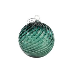 a green glass ball ornament on a white background