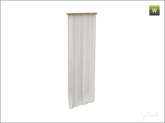 a white curtain hanging on the side of a wall