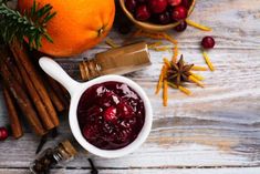 cranberry sauce with cinnamon sticks and oranges