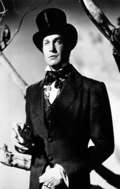 black and white photograph of a man wearing a top hat