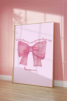 a pink wall with a bow on it and the words, god is all that you have