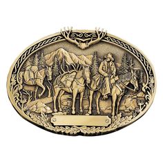 Small, oval cast brass Attitude belt buckle with smooth polished brass trim around intricate twist detail up each side meeting at the top behind a small antler rack. Antiqued brass figures of a cowboy leading two pack horses stands in front of an detailed antiqued mountain scene. Our cast brass belt buckles are acid washed to add the dark antiqued patina and hand buffed to bring out the highlights and details. Standard 1.5 Country Belt Buckles, Antler Rack, Country Belts, Hunting Packs, Brass Trim, Western Buckles, Cowboy Belt, Elk Hunting, Brass Belt Buckles