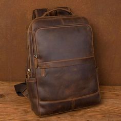 Crazy Horse Leather Backpack Men Laptop Backpack Handmade Travel Backpack MSG7635 Model Number: MSG7635 Dimensions: Standard Size: 11.4"L x 4.3"W x 16.5"H / 29 cm(L) x 11 cm(W) x 42 cm(H) Large Size: 13.8"L x 5.1"W x 18.5"H / 35 cm(L) x 13 cm(W) x 47 cm(H) Weight: 4 lb / 1.9 kg Shoulder Strap: Adjustable Color: Dark Brown Features: • Genuine Natural Leather• Inside 1 Wallet Pocket, 1 Cell Pocket, 1 Zipper Pocket, 1 Laptop Sleeve, 2 Front Zipper Pockets, 1 Back Zipper Pocket.• YKK Zipper• Adjusta Vintage Rectangular Backpack For Business, Casual Leather Business Backpack Rectangular, Vintage Business Backpack, Classic Leather Backpack For Outdoor, Mens Leather Sling Bag, Leather Backpack Men, Leather School Backpack, Leather Travel Backpack, Vintage Leather Backpack