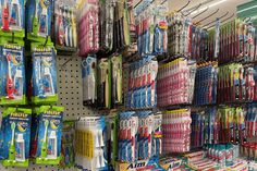 a store display filled with lots of toothbrushes