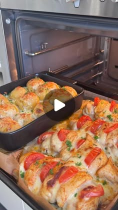 a pan filled with food sitting inside of an oven