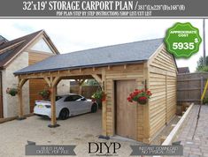 a car is parked in front of a wooden garage with flowers on the windows and doors