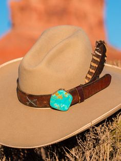 This band is what started it all! Our Pinnacle band on vintage latigo leather is such a statement piece! I couldn't see all the latigos on our ranch getting thrown out and visualized a large geometric piece of turquoise as a buckle, and made it happen. Theses chunks of Kingman turquoise are outstanding and I find the ranchiest leather possible! You will love it! We can add any western charms to the bands, Arrows, Conchos, or Bucking horses. Kingman Turquoise, Made It, Charms, Buckle, Horses, Turquoise, Band, Leather