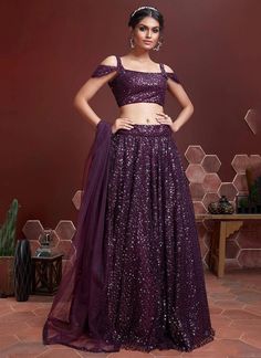 Introducing our luxurious Purple Sequins Silk Lehenga Choli, the perfect statement piece for any occasion. Made from high-quality Chinon silk, this readymade ensemble exudes elegance and sophistication. Whether you're attending a wedding or a festive party, our lehenga choli will make you stand out as a tasteful and exclusive fashionista. The unstitched blouse can be customized upto 46 inches. Do Note: All the accessories shown are for styling purpose only. Slight color variation may occur due t New Lehenga Choli, New Lehenga, Sequin Lehenga, Purple Lehenga, Blouse Lehenga, Lehenga Choli Designs, Party Wear Lehenga Choli, Net Blouses, Lengha Choli