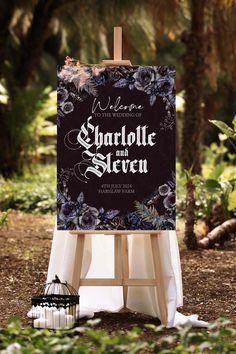 an easel with a wedding sign on it