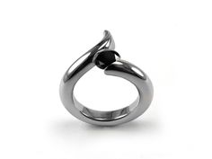 1ct Black Onyx Swirl Bypass Tension Set Ring in Stainless Steel | Taormina Jewelry Bypass Engagement Ring, Tension Ring, Tension Setting, Circular Motion, Bypass Ring, Set Ring, Mens Pendant, Ring Metal, Steel Jewelry