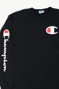 "Size: X-Large Brand: Champion Color: Black Material: Cotton Made In: Honduras Length: 29.5\" Chest Width: 22\" Vintage Condition Notes: - Stain on graphic on right sleeve" Sporty Branded T-shirt For Fall, Long Sleeve T-shirt For Streetwear, Long Sleeve Branding T-shirt For Streetwear, Black Logo Print T-shirt For Fall, Black Tops With Branding For Fall, Sporty Long Sleeve T-shirt With Graphic Design, Sporty Long Sleeve T-shirt With Text Print, Sporty Long Sleeve Branded T-shirt, Sporty Long Sleeve T-shirt With Branding