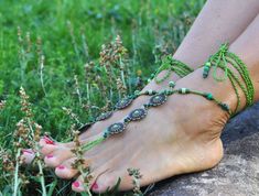 This listing is for a pair of barefoot sandals. Beautiful and unique barefoot sandals with a spring vibration. They look great as necklace or on the hands too :) Handmade crocheted with love and care using waxed polyester cord, antique bronze flower links, greek ceramic beads and czech seed beads. The lace is long enough to wrap it 2 times around the leg. These resistant sandals are suitable for many environments. You can wear it barefoot on the beach :) They will embellish your feet and you can Adjustable Barefoot Sandals As Spring Gift, Adjustable Barefoot Sandals For Spring Gift, Hippie Beach Jewelry For Spring, Summer Festival Macrame Jewelry, Hippie Style Beach Jewelry For Spring, Spring Beach Hippie Jewelry, Handmade Anklets For Beach And Spring Season, Handmade Anklets For Beach In Spring, Bohemian Anklets For Beach In Spring