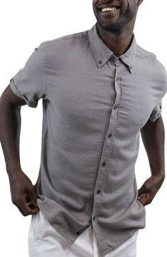 Enjoy the breathable comfort of a classic fit short-sleeve button-down shirt constructed from a soft linen blend. Front button closure Button-down collar Short sleeves 55% linen, 45% viscose Dry clean or machine wash, dry flat Imported Slim Fit Solid Color Shirt With Short Sleeves, Slim Fit Solid Color Short Sleeve Shirt, Solid Color Slim Fit Shirt With Short Sleeves, Solid Color Slim Fit Short Sleeve Shirt, Gray Relaxed Fit Shirt With Buttons, Gray Slim Fit Button-up Top, Gray Short Sleeve Shirt With Button Closure, Gray Short Sleeve Top With Button Closure, Slim Fit Short Sleeve Shirt With Button Closure