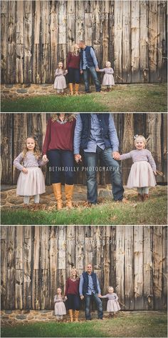 the family is posing for pictures in front of a wooden fence with their hands on each other