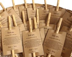 paper tags attached to wooden sticks in a basket