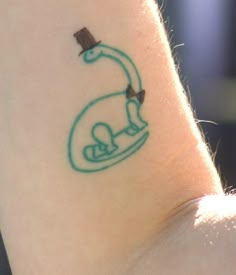 a person with a small tattoo on their arm