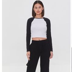 Style Deals - A Ribbed Knit Baseball Tee Featuring Long Raglan Sleeves, A Crew Neck, And Cropped Hem. Content + Care - Shell: 58% Cotton, 37% Polyester, 5% Spandex - Hand Wash Cold Baseball Crop Top, Forever 21 Casual Streetwear Top, Casual Streetwear Tops From Forever 21, Forever 21 Casual Long Sleeve Crop Top, Casual Long Sleeve Crop Top By Forever 21, Forever 21 Casual Crop Top For Streetwear, Casual Forever 21 Crop Top For Streetwear, Sporty Long Sleeve Tops By Forever 21, Forever 21 Casual Crew Neck Crop Top