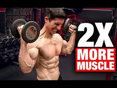 a man holding two dumbs in front of his face with the words 2x more muscle