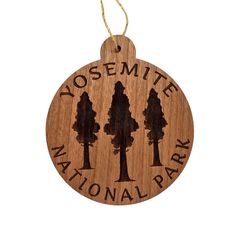 a wooden ornament with the words yosemite national park hanging on it