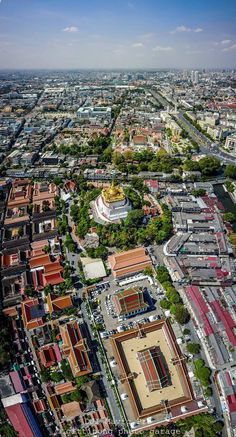 an aerial view of a city with lots of buildings