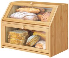 a wooden box filled with lots of different types of bread