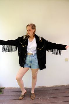 "AMAZING vintage Native American beaded fringe suede jacket in black, fully lined, buttons down the front, pockets, inside pocket. aside from minor signs of wear, good vintage condition, all the fringes intact. Approximate size: One size fits most .. tag reads size 42 for men - - oversize fit on the model-- please refer to measurements. ** Model is 5'7\" and size S/M for reference M E A S U R E M E N T S -were taken with garments laying flat, please double where necessary. ---------------------- Black Leather Jacket With Long Sleeves For Festivals, Black Long Sleeve Leather Jacket For Festival, Winter Festival Outerwear With Beaded Fringe, Winter Festival Leather Jacket With Fringe, Bohemian Winter Outerwear With Beaded Fringe, Bohemian Long Sleeve Leather Jacket With Fringe, Long Sleeve Beaded Fringe Festival Outerwear, Bohemian Festival Outerwear With Beaded Fringe, Winter Outerwear With Beaded Fringe And Long Sleeves