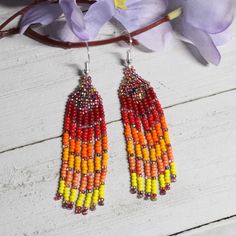 Handmade Seed Beaded Earrings Magic Raspberry Bright Colorful Earrings 3” Long Earrings Are Handwoven And Designed By Me. Made With High Quality Materials And Craftsmanship. Colors Used Are 2 Shades Of Red, 2 Shades Of Orange, Coral, Yellow And Magic Raspberry. Colors Can Be Customized If Preferred. Just Send Me A Message With Any Preference You May Have. Approximately 3 Inches Long With Ear Hook With A 2.5 Inch Drop. Ear Hook Is Sterling Silver With The 925 Stamp. Ear Hooks Can Be Substituted W Multicolor Beaded Chain Earrings As Gift, Multicolor Beaded Chain Earrings For Gift, Multicolor Beaded Chain Earrings For Summer, Summer Multicolor Beaded Chain Earrings, Coach Earrings, Art Deco Abstract, Purple Feather, Handmade Jewelry Earrings, Pearl Hoop Earrings