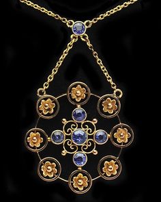 A lovely Antique Edwardian 10k gold Blue Sapphire Flower Posy necklace. The chain without enhancer measures 17 inches length - enhancer measures 1 1/2 inches length x 1" width. Sapphires bezel set and beautiful arranged as the focal point inside the circle of flowers.  Marks: No marks as is to be expected. Gold was acid tested to ensure metal purity. Pieces like this simply do not appear very often. Would make a wonderful gift or addition to any fine jewelry collection. Flower Posy, Accessory Inspo, Antique Jewelry Necklace, Sapphire Necklace, Fine Jewelry Collection, The Circle, 10k Gold, Vintage Watches, Focal Point