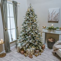 a decorated christmas tree in a living room