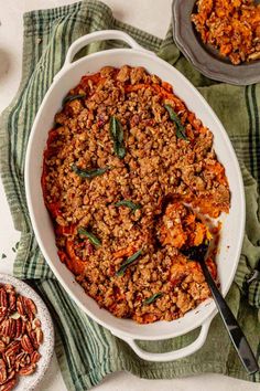 This sweet potato casserole with streusel topping is a holiday classic featuring a brown butter streusel topping with chopped pecans. It’s rich, creamy, and topped with crispy sage for a cozy, unforgettable side dish perfect for Thanksgiving. Topping For Sweet Potato Casserole, Sweet Potato Casserole With Streusel, Pumpkin And Feta Salad, Sweet Potato Thanksgiving, Gluten Free Stuffing, Sweet Potatoe Bites, Cauliflower Gratin, Thanksgiving Recipe, Potato Bites