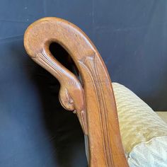 an antique wooden headboard and foot board for a bed or couch with a blue background