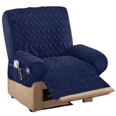 a blue recliner chair covered in a quilted cover with a wooden leg rest