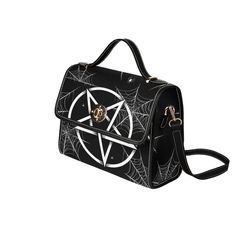 "This secure and adjustable goth crossbody bag is crafted from quality, waterproof canvas, and faux leather straps, making it perfect for everyday use. The compact design allows you to store all of your essentials, while the on-trend goth style makes a fashion statement. With its magnetic snap closure and roomy interior, this bag is more than just an accessory; it's also an ideal storage solution for iPads or college supplies. Now you can stay organized and stylish at the same time! 💜 Made from Gothic Black Shoulder Bag With Adjustable Strap, Gothic Black Bags With Large Capacity, Black Gothic Bag With Large Capacity, Gothic Large Capacity Black Bag, Gothic Bags With Adjustable Strap For Halloween, Gothic Black School Bag, Gothic Black Crossbody Bag, Black Gothic Bag For School, Black Gothic Crossbody Bag