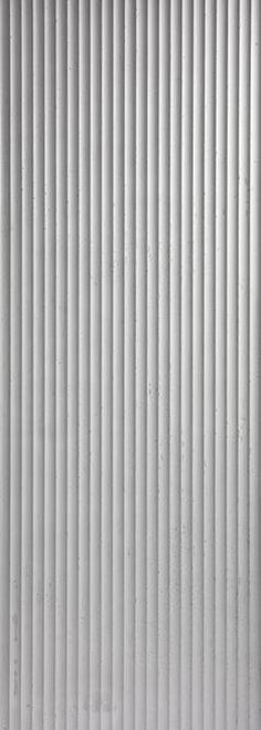 a black and white photo of the side of a building with vertical blinds on it