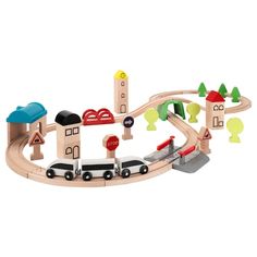 a toy train set with cars and buildings on the tracks for children to play in