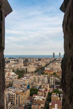 view from the top of a tower in barcelona, spain looking out at the city below