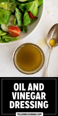 a bowl of salad with dressing next to it and a spoon on the side that says oil and vinegar dressing