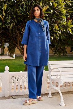 Blue shirt tunic with contrast front buttons. Comes with coordinating pant. - Aza Fashions Button-up Sets For Daywear, Button-up Sets For Daywear With Buttons, Summer Workwear Sets With Set-in Sleeves, Summer Workwear Kurta With Long Sleeves, Blue Pant Set For Spring Workwear, Blue Workwear Sets With Button Closure, Blue Long Sleeve Pant Set For Work, Relaxed Fit Button-up Sets With Buttons, Blue Sets With Button Closure For Work