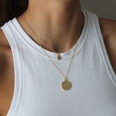 A unique silver or gold coin necklace is a must have, timeless addition to your jewellery collection. The mini Queen Elizabeth coin necklace looks adorable on layered or worn solo!   Historically, coin necklaces were given as a token of love, a sentimental reminder to keep the giver's memory close at heart. They were worn to bring luck and good fortune to the wearer.    💖 Details 925 Sterling Silver & 18k gold plated 41 cm - 46 cm including 5 cm extension chain Pendant: 10 mm 💕 Stay up-to-date with new designs & special offers - FOLLOW ME - website: thejewellerytree.net   Socials: @myjewellerytree OR https://www.facebook.com/thejewellerytree1/   💕 Need more info, feel free to email - I'd love to help 💕And please visit my NEW store https://www.etsy.com/au/shop/TheJewelleryTreeCo  I care Silver Charm Necklace With Coin Pendant For Layering, Dainty Coin Pendant Necklace For Everyday, Dainty Everyday Necklace With Coin Pendant, Chain Necklace With Coin Pendant For Layering, Silver Charm Necklaces With Coin Pendant, Everyday Coin Necklace With Round Pendant And Clavicle Chain, Everyday Round Pendant Coin Necklace With Clavicle Chain, Silver Coin Necklace For Layering, Silver Coin Pendant Necklace For Layering