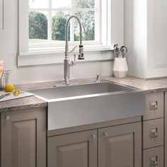 The Vault apron-front kitchen sink combines the sleek, modern look of stainless steel with the traditional farmhouse style. Made to seamlessly coordinate with a variety of decors, this sink features a single bowl with tightly angled corners to maximize basin space, and a top-mount design for easy installation and use on most laminate countertops. Vault's ultra-flat rim makes it easy to wipe from the counter directly into the sink. KOHLER Vault Farmhouse Apron Front 35.75-in x 24.31-in Stainless Single Basin Sink Kitchen, Stainless Apron Sink Kitchen, Xl Kitchen Sink, Stainless Farm Sink, Large Kitchen Sink Ideas, Apron Sink Farmhouse, Farmers Sink Kitchen, Modern Farmhouse Kitchen Sink, Farmhouse Kitchen Sink Ideas